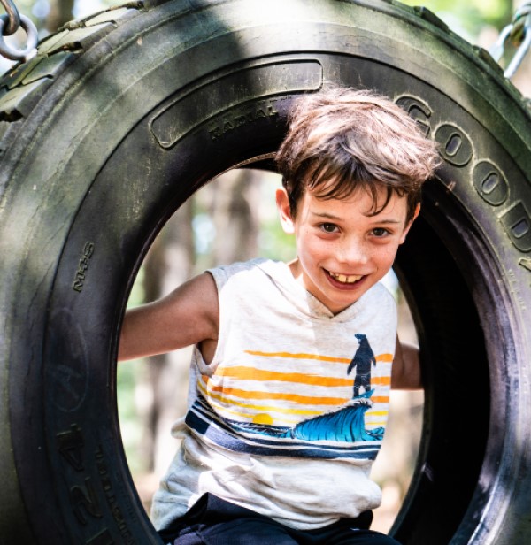 boy on tire